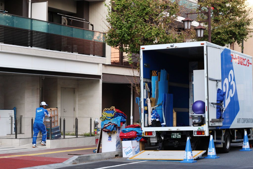 Japanese moving truck and workers