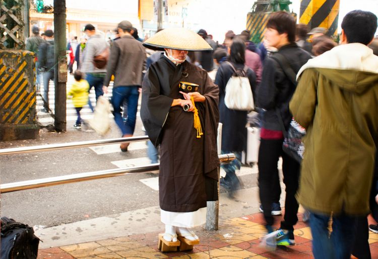 Japan Monk by Busy Crosswalk